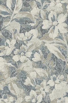 a blue and white floral wallpaper with flowers on the side, in an ornate pattern