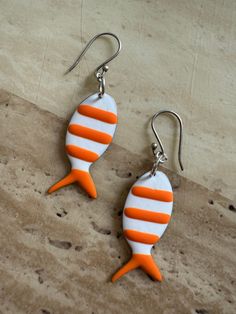 Beautiful enamel dangles orange  fishes. Sterling silver earrhooks. Orange Fish, Pretty Orange, Etsy Earrings Dangle, Jewelry Earrings Dangle, United Kingdom, Dangle Drop Earrings, Polymer Clay, Dangle Earrings, Jewelry Earrings