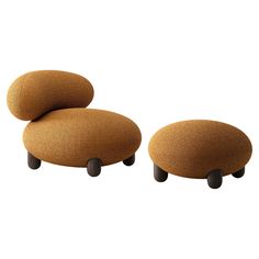 two brown footstools sitting next to each other