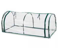 a clear plastic storage bag with green trimmings on the bottom and sides, attached to a white background