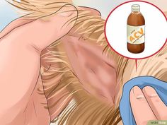 a woman is rubbing her face with a bottle of cough syrup on her chest and hand