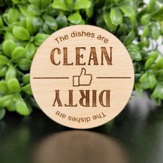 a wooden sign that says the dishes are clean and aldi