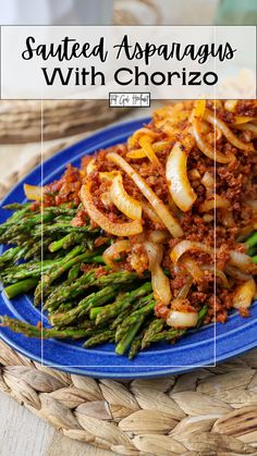 asparagus with chorizzo on a blue plate