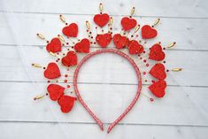 "Score unique beautiful floral decorations for any event Queen of hearts crown Valentines headpiece red hearts headband -Crown height 10 cm (4 \") -Ready for shipment I will also send you a tracking number of your package. Standard international shipping takes up to 20 business days. Normal delivery time out from Ukraine takes about: U.S. - 10-30 days Canada - 14-25 days European Union countries - 9-15 days ( excluding Italy - 20-25 days ) Australia - 15-30 days New Zealand - 13-25 days South Af Cupid Headband, Queen Of Hearts Crown, Witch Headband, Headband Crown, Heart Headband, Heart Crown, Star Headband, Crystal Hair Comb, Normal Delivery