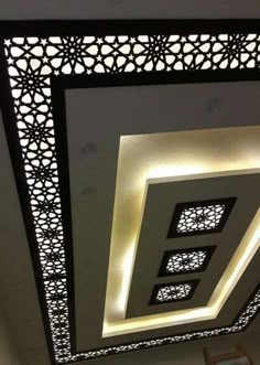 the ceiling is decorated with black and white designs