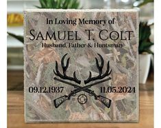 a memorial stone with the words in loving memory of samuel colt, husband and hunter