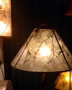 two lamps that are sitting next to each other