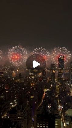 fireworks in the sky over a city at night