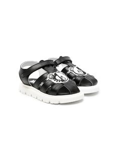 black/white calf leather signature Teddy Bear motif appliqué logo ankle touch-strap fastening caged design round toe branded leather insole ridged rubber sole Kids Teddy Bear, Moschino Kids, Kenzo Kids, Stella Mccartney Kids, Gorgeous Bags, Open Toe Sandals, Italian Luxury, Sandals Black, Boys Shoes