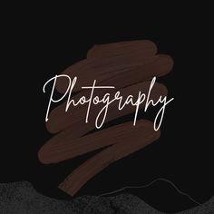 the word photography written in white ink on a black background with brown and gray brush strokes