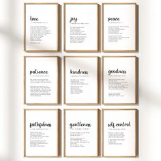 six wooden frames with the names of different types of words in black and white on them