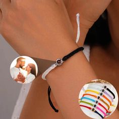 a woman wearing a bracelet with an image of a man and his wife on it