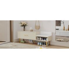 a white dresser sitting next to a mirror in a room with shoes on the floor