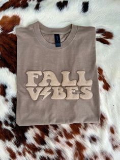 Comes as shown Short Sleeve Sweatshirt With Text Print For Fall, Fall Short Sleeve Sweatshirt With Text Print, Fall Text Print Short Sleeve Sweatshirt, Trendy Fall Slogan Tops, Trendy Slogan Tops For Fall, Trendy Pre-shrunk Fall Sweatshirt, Fall Embroidered Graphic Tee, Trendy Embroidered Graphics Tops For Fall, Embroidered Graphic Tee For Fall