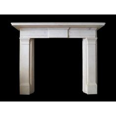 a white fireplace with a black background