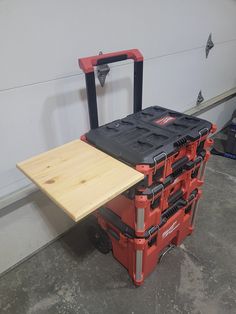 a work bench with tools on it in a garage