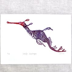 a drawing of a lizard with scissors on it's back legs is shown in red and blue