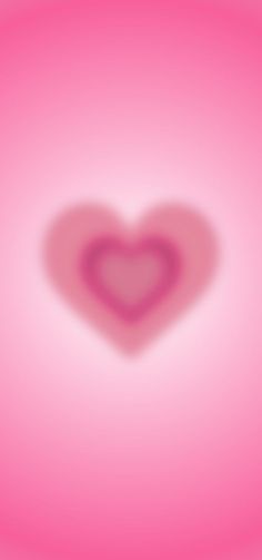 a heart shaped object on a pink background