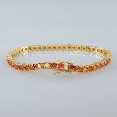 Brand New Women's Gold Amber Gemstone Tennis Bracelet Available In 7" & 8" Sizes (7" Is The Most Common Women's Size) Width 4mm 14k Gold Plated Sterling Silver Genuine 2ct Natural Orange Amber Gemstones Retail Price $400 Buy With Confidence From A Top Rated Seller With A 99%+ Rating! Also Available In Silver. Sold Separately. A0736 (Id-651) Red Gemstone Tennis Bracelet, Elegant Hand-strung Amber Bracelet, Luxury Vintage Amber Bracelets, Elegant Orange Gemstone Bracelet, Hand-strung Amber Bracelet Jewelry, Amber Hand-strung Round Crystal Bracelet, Amber Gemstone, Orange Gold, Tennis Bracelet