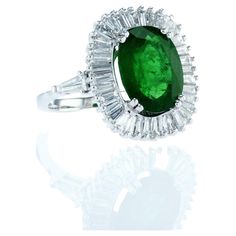 Luxury Marquise Emerald Ring, Elegant Oval Diamond Ring With Baguette Diamonds, Hallmarked Oval Emerald Ring In Platinum, Oval Hallmarked Emerald Ring In Platinum, Timeless Oval Diamond Ring With Baguette Accents, Timeless Oval Diamond Ring With Baguette Diamonds, Luxury Formal Cluster Ring With Baguette Diamonds, Luxury Baguette Diamond Cluster Ring For Formal Occasions, Luxury Formal Halo Ring With Baguette Cut