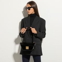 The Arcadia Trapeze combines geometric lines and an oversized front turn lock to create a contemporary style yet chic. A desing that stands out and matches perfectly with evening outfits. Italian Leather Handbags, Evening Outfits, Geometric Lines, Small Shoulder Bag, Italian Leather, Real Leather, Calf Leather, Contemporary Style, Leather Handbags