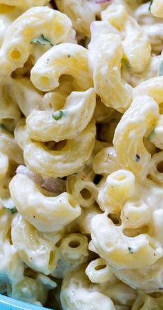 macaroni and cheese salad in a blue bowl