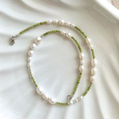 ✋100% HANDMADE ☘️ This handmade necklace is composed of light green jade, freshwater pearls, and silver glass beads. The color is fresh and elegant. It is very suitable for giving it as a gift to mother, girlfriend, wife, or yourself.     📏SIZE: 46cm long / 18 inch * If you need other lengths, please contact me or leave a message in the order. 📿 MATERIALS: 5-10mm natural freshwater pearl 3mm jade  3mm miyuki glass beads 14K Gold plated clasp 📦 PACKAGING: Each piece comes with a dust/moisture proof bag and a cotton bag for storage when not worn. They will be sent in a well-wrapped condition. If you have any ideas for the packaging, such as adding gift cards and messages, etc., please feel free to contact me. ✈️ SHIPPING AND DELIVERY: I fully understand your concerns about international s Gift To Mother, Choker Handmade, Gemstone Choker, Jewelry Personalized, Necklace Pearl, Pearl Gemstone, Green Jade, Freshwater Pearl Necklaces, Jade Green