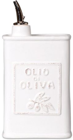 a white flask with an olive design on it