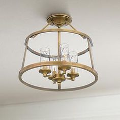 a light fixture hanging from the ceiling in a room