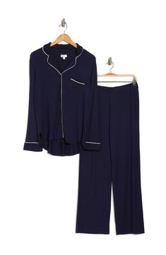 A soft jersey knit pajama set with a pretty print delivers feminine style and essential comfort. 2-piece set Shirt: 25" length (size S); Pants: 9.5" rise, 32" inseam (size S) Shirt: notch lapel, long sleeves, front button closures, chest patch pocket, allover print, contrast piping, knit construction Pants: elasticized waist, pull-on style, allover print, knit construction 95% rayon, 5% spandex Machine wash cold Imported Model’s stats for sizing: 5’11” height, 32” bust, 24” waist, 34” hips. Mode Navy Peacoat, Pretty Prints, Shirt And Pants, Drawstring Pants, Feminine Style, Knit Jersey, Effortless Style, Pajama Set, Pajamas