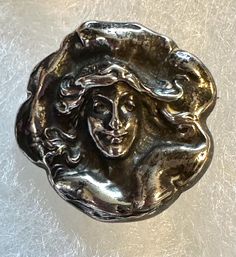 Lovely art nouveau chatelaine pin with a 3D design of a woman's face with flowing hair. It is marked "Copyright 1901 Sterling".  Condition is very good. Flowing Hair, Chatelaine, Antique Art, 3d Design, Woman Face, Brooch Pin, Brooches, Art Nouveau, Sterling Silver