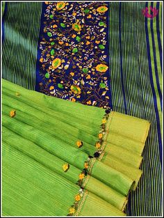 This elegant cotton jute silk saree in parrot green features a contrast blue pallu and border decorated with hand embroidered floral designs. The body of the saree is also adorned with hand embroidered floral designs for a timeless, sophisticated look. Its unique color combination and matching blouse piece in blue with hand embroidery on the sleeves make this saree truly special. Please note: Color may vary slightly from the picture. Thread knots ,Thread pulls and minor inconsistencies are chara Designer Green Slub Silk Dupatta, Green Slub Silk Traditional Wear With Resham Embroidery, Green Cotton Silk Traditional Wear With Embroidered Border, Green Cotton Silk Traditional Wear With Resham Embroidery, Green Traditional Wear With Embroidered Cotton Silk, Embroidered Green Slub Silk Traditional Wear, Green Embroidered Slub Silk Traditional Wear, Green Cotton Silk Dupatta With Embroidered Border, Pista Green Embroidered Slub Silk Dupatta