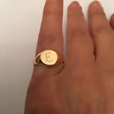 "Pinky ring, Engraved ring, Initial Ring, Personalized Ring Engraved Signet ring with Round Seal- Best quality 18k Gold Plate Engraved 1 letter - Vintage style Diameter: 0.7 mm = 0.27\" Please note in the \"notes to seller\" at checkout. : * state your ring size * letter you want to apper The product will arrive to you packed in gift box and padded envelope to maintain the product Our jewelry are water resistant and comes with 1 year warranty For more rings from us: https://www.etsy.com/il-en/sh Monogram Open Ring Jewelry, 14k Gold Monogram Rings, Engraved Open Ring With Initials For Promise, Adjustable 14k Stamped Initial Ring, Open Ring With Monogram, Initials Engraved Round Promise Ring, Personalized Rings As Gifts, Monogram Engraved Open Ring For Promise, Personalized Open Ring Jewelry For Proposal