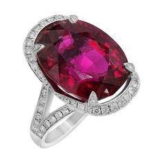 Ring White Gold 18 K Diamond 82-RND-0,99-F/VVS1A Diamond 12-RND-0,05-G/VVS1A Garnet 1-17,95ct Weight 11,04 gram Size 17 With a heritage of ancient fine Swiss jewelry traditions, NATKINA is a Geneva based jewellery brand, which creates modern jewellery masterpieces suitable for every day life. It is our honour to create fine jewelry, and it’s for that reason that we choose to only work with high-quality, enduring materials that can almost immediately turn into family heirlooms. From our selection of precious metals set with genuine precious stones, you can rest assured that NATKINA is jewelry for your everyday life, forever. Rubellite Ring, Stunning Aesthetic, Garnet And Diamond Ring, Piercing Septum, Burmese Ruby, Jewelry Magazine, Rubellite Tourmaline, Platinum Diamond Rings, Art Deco Diamond