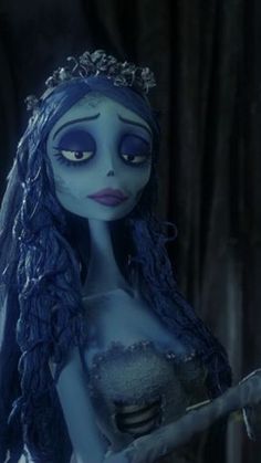 the corpse bride is holding a knife in her hand