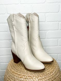 Raylyn cowboy boots from Lush Fashion Lounge women's boutique in Oklahoma City. Lush boutique in OKC has a variety of cute and affordable shoes! You are sure to love these trendy cowboy boots! True to size. 3 inch heel Ivory Cowboy Boots, Ivory Idyllwind Boots, Womens Python Cowboy Boots, White Western Style Mid-calf Boots, White Western Mid-calf Boots With Wide Calf, Ankle Cowboy Boots, Affordable Shoes, 3 Inch Heels, Ladies Boutique