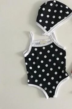 Polka Dot One Piece Baby Swimwear - Momorii Fitted Cotton Playful Swimwear, Playful Fitted Cotton Swimwear, Casual Polka Dot Swimwear For Summer, Casual Sleeveless Swimwear With Polka Dot Pattern, Black Summer Beachwear Swimwear, Casual Sleeveless Polka Dot Swimwear, Polka Dot Sleeveless Summer Swimwear, Sleeveless Polka Dot Summer Swimwear, Modern Swimsuit