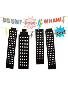 some paper cutouts are hanging on a string with the words boom pow wham