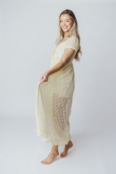 Slip on this maxi dress for an instantly-elevated outfit - the Lindsey is all lace and no fuss. We love its delicate vintage lace overlay, combined with a sweetheart neckline and puffed sleeves. It's a beautiful, feminine choice for any occasion! Available in two colorways. FIT: Runs true to size. MATERIAL: Self: 90% Nylon, 10% Spandex; Lining: 100% Rayon. GARMENT DETAILS: Lightweight maxi dress with an inverted empire waist silhouette. Features a low sweetheart neckline, ruffled short sleeves, and a self-tie ribbon accent at the bust. Finished with a flounced ruffled hem, and smocked back panel. Partially lined with mini-skirt length lining. SIZE GUIDE: S (2-4) / M (6-8) / L (10-12) MODEL DETAILS: Mackenzie - Size S Heather - Size S Molly - Size XL Our Brunette Misses Model Our Blonde Mis Flowy Maxi Dress With Lace Patchwork, Flowy Maxi Dress With Lace Bodice, Feminine Lace Maxi Dress For Garden Party, Feminine Lace Maxi Dress For Summer, Spring Garden Party Lace Maxi Dress, Spring Lace Maxi Dress With Sweetheart Neckline, Spring Maxi Dress With Sweetheart Neckline In Lace, Lace Maxi Dress With Lace Trim For Brunch, Lace Trim Maxi Dress For Brunch