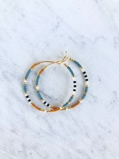 Multi Colored Beaded Hoop Earrings Dainty hoop earrings | Etsy Hoop Beaded Earrings With Spacer Beads, Trendy Gold Hoop Earrings With Colorful Beads, Gold Hoop Earrings With Colorful Beads For Everyday, Trendy Gold Hoop Beaded Earrings, Trendy Gold Beaded Hoop Earrings, Everyday Gold Hoop Earrings With Colorful Beads, Gold Small Hoop Earrings With Spacer Beads, Everyday Colorful Beaded Hoop Earrings, Summer Jewlery