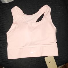 Brand New Pink Nike Sports Bra. Medium Support Size Small. Nike Sports Bra For Spring, Nike Spring Sports Bra, Nike Sporty Sports Bra For Spring, Nike Pink Sports Bra For Light Sports, Nike Sports Bra For Spring Sports, Nike Pink Casual Sports Bra, Casual Pink Nike Sports Bra, Nike Sports Bra For Light Exercise, Nike Pink Sports Bra For Spring