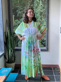 I made this caftan dress from a beautiful watercolor floral pattern and is available in many colors. I used the softest mulmul cotton fabric to make this. It is extremely soft and it gets softer with every wash.It is so free flowing, that it will make you feel as if you aren't wearing anything at all ;)The beauty of the Kaftans is they will fit everyone so no need to worry about the size et all. All my Kaftans have deep necks(11-12 inches) so will fit all head sizes.However, the length of my kaf Floral Print Flowy Maxi Cover-up, Green Floral Print Maxi Kaftan, Green Floral Print Tunic Kaftan, Printed Summer Maxi Dress With Kimono Sleeves, Floral Print Free Size Maxi Dress For Beach, Free Size Floral Print Maxi Dress For Beachwear, Summer Dresses With Kimono Sleeves In White, Beachwear Floral Print Maxi Dress In Free Size, Green Flowy Kaftan With Short Sleeves