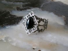 This beautiful sterling silver plated filigree ring has a sterling silver plated filigree setting with black obsidian stone. Adjustable. Gothic Anniversary Ring With Intricate Design, Gothic Metal Jewelry For Anniversary, Elegant Metal Rings With Intricate Design, Gothic Silver Rings With Intricate Design, Gothic Formal Adjustable Rings, Silver Gothic Rings For Formal Occasions, Gothic Style Adjustable Rings For Formal Occasions, Gothic Adjustable Rings For Formal Occasion, Gothic Style Silver Ring With Gemstone