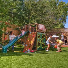 children playing in the backyard with a slide and basketball hoop on it's side