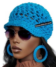 a woman wearing sunglasses and a crocheted hat with large hoop earrings on her head