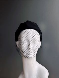 Sophistication and simple elegance. You’ll love our women's black headband featuring a delicate black veil gracefully draping over the face. As this is a simple all black hairpiece, it can also be worn as a funeral mourning veil. Age Group/Gender - Adult/Women Size/Type - One size fits all adults Color - Black Mask Material - Fabric/Netting Special Features - Veil Personalization - Not available Elegant Black Headband Fascinator, Elegant Evening Veil With Headband, Elegant Black Party Veil, Black Headband Fascinator For Evening, Black Adjustable Headband For Evening, Adjustable Black Headband For Evening, Elegant Black Formal Headband, Black Fascinator With Pinched Crown, Black Adjustable Headband For Formal Occasions