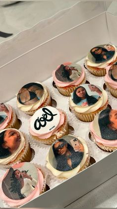 cupcakes with pictures of people on them in a box