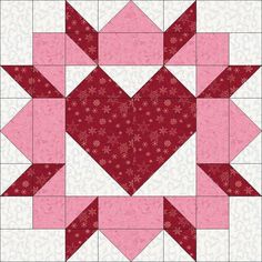 a heart shaped quilt block with pink and red flowers on the bottom, along with white background