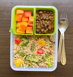 two plastic containers filled with rice, beans and veggies next to a fork