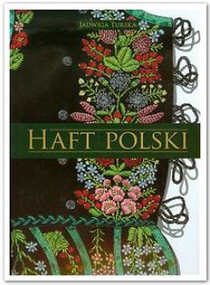 the front cover of a book with embroidered flowers and leaves on black fabric, which reads polish embroiderry